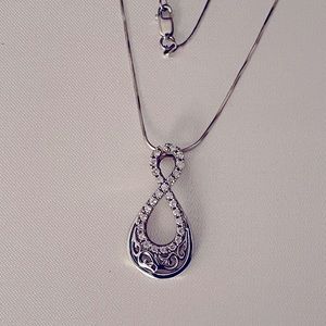 Na Hoku!! 14KW with Diamonds Nalani Infinity Necklace! .54 CTW dia, 1 1/8 inch